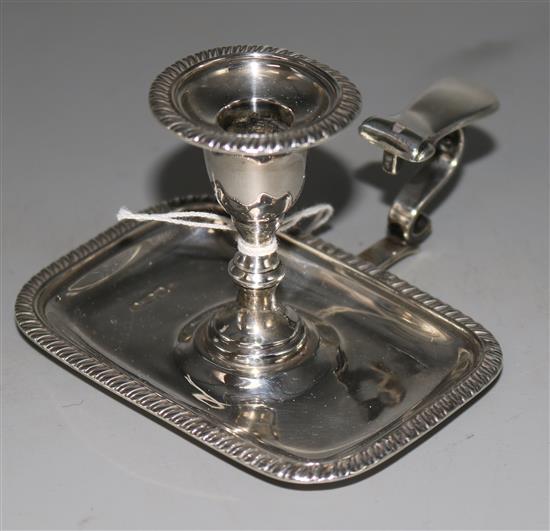 A late Victorian silver chamberstick by Henry Stratford, Sheffield, 1891, lacking snuffer, width 3.75in
